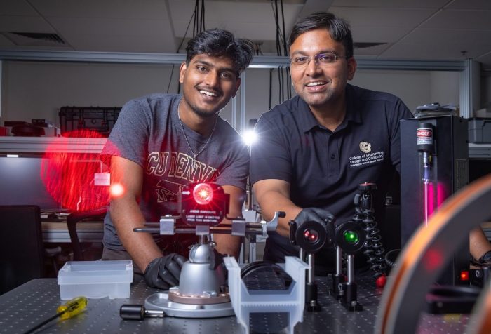 Graduate student Kalyan Tirumalasetty (left) and Assistant Professor of Electrical Engineering Aakash Sahai work on their quantum technology in a lab.