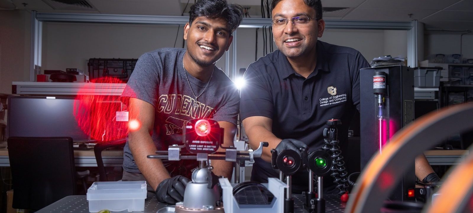 Graduate student Kalyan Tirumalasetty (left) and Assistant Professor of Electrical Engineering Aakash Sahai work on their quantum technology in a lab.