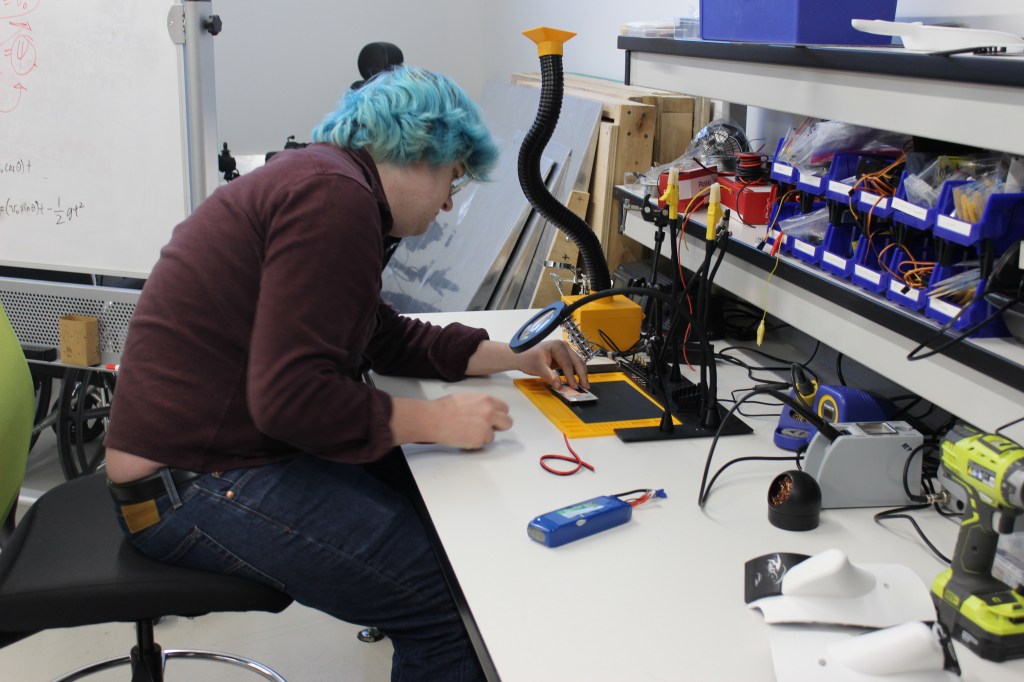 Jack Lueck works in the lab