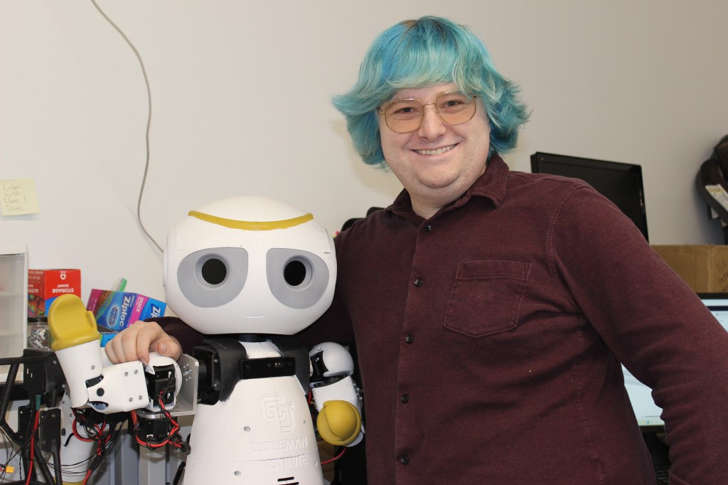 Jack Lueck with the Social Assistive Robot coming out of CIDE